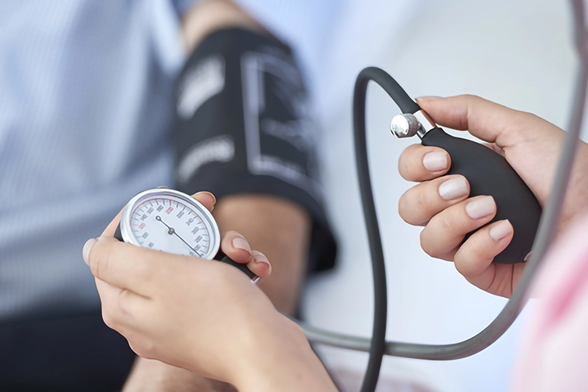 a patient having their blood pressure checked